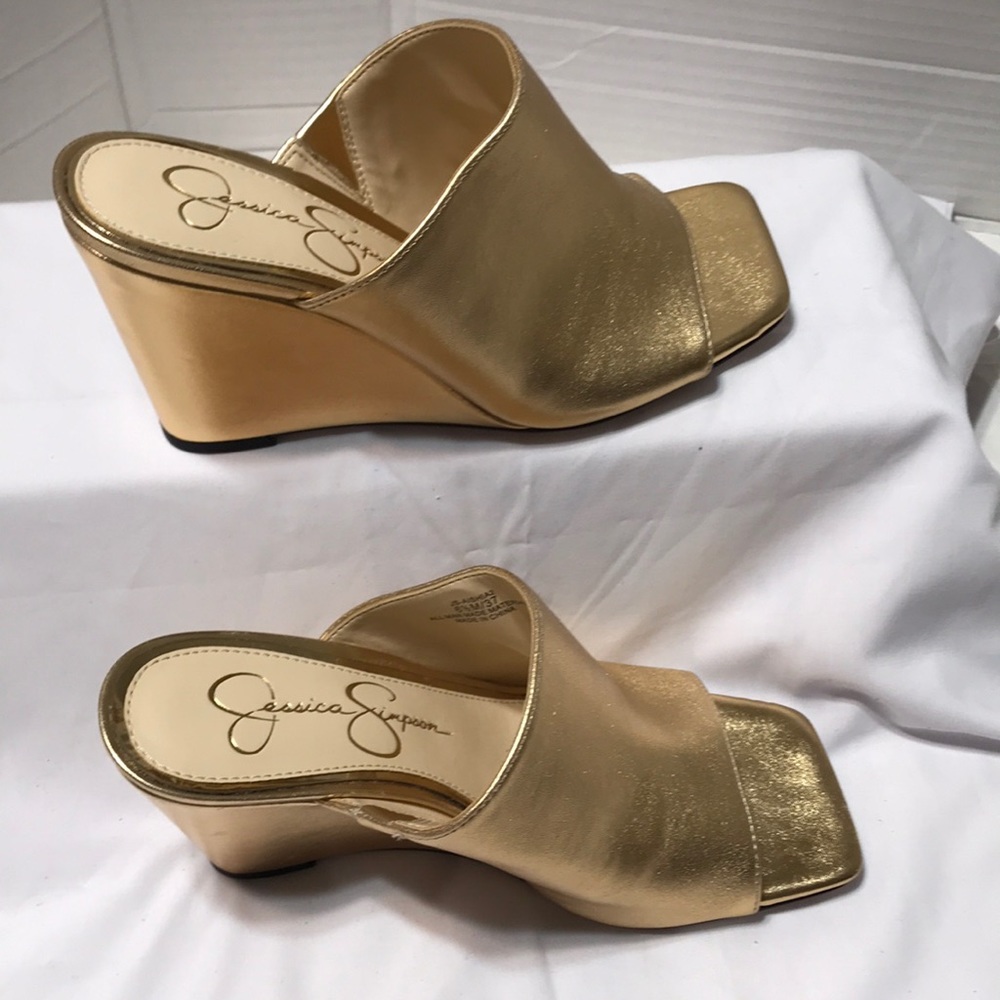 Jessica Simpson gold wedge. Very dressy and stylish. NWOT